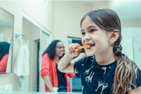 Common Pediatric Dental Issues and How to Prevent Them A Kid Brushing Their Teeth