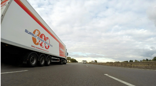 How To Choose the Best Travel Insurance To Cover Road Accidents? Truck traveling interstate